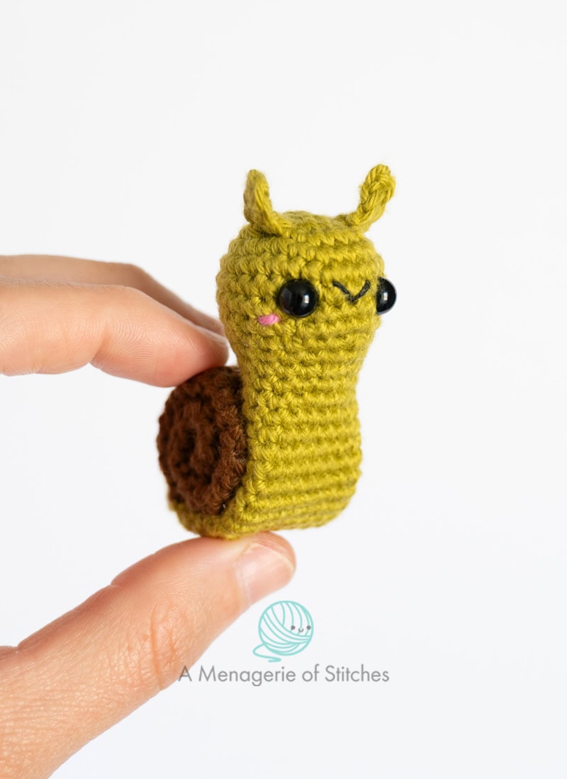 SPRING CAL FEATURE IMAGE A Menagerie of Stitches Snail Crochet Pattern